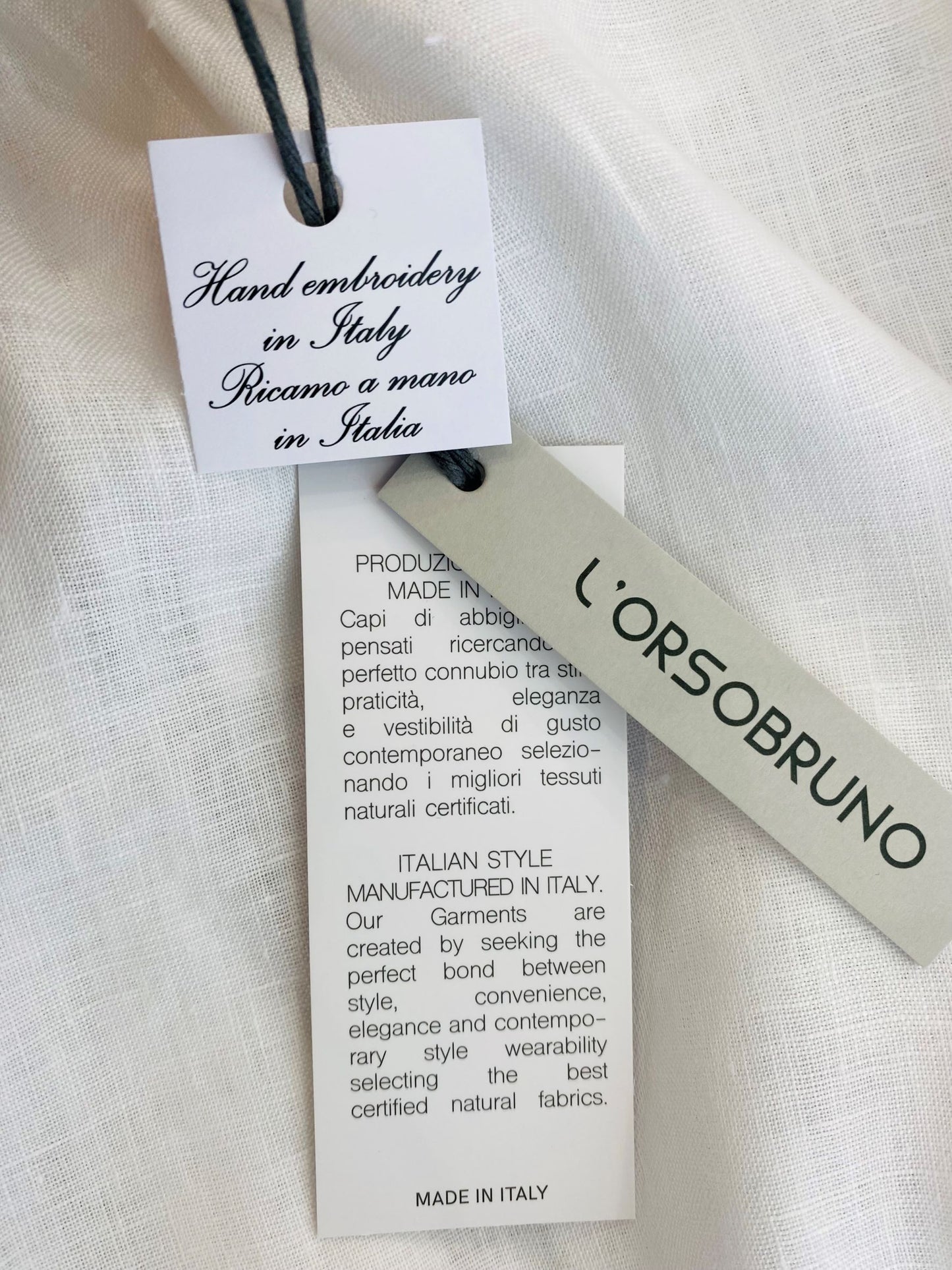 Pagliaccetto in lino con ricamo spighe di grano