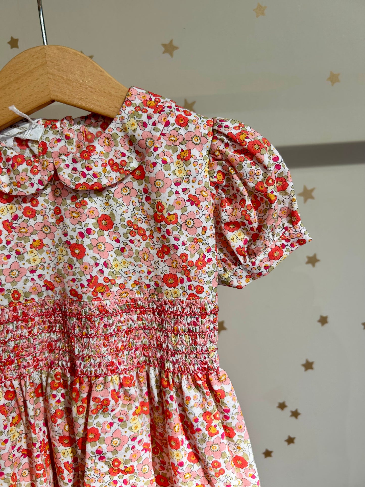 Abito baby fiori punto smock