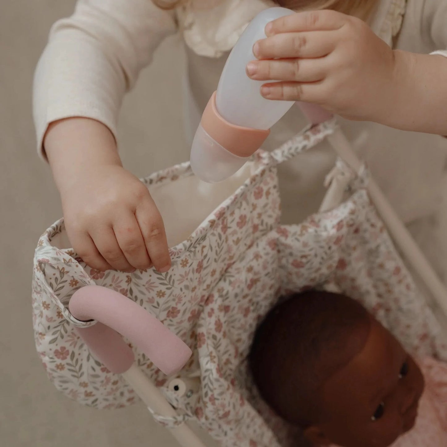 Passeggino bambole in metallo bianco/rosa