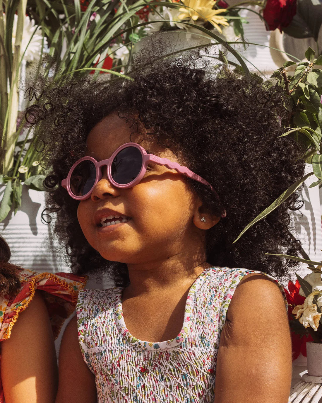 Occhiali da sole rotondi baby rosa Rock Rose 1-3 anni