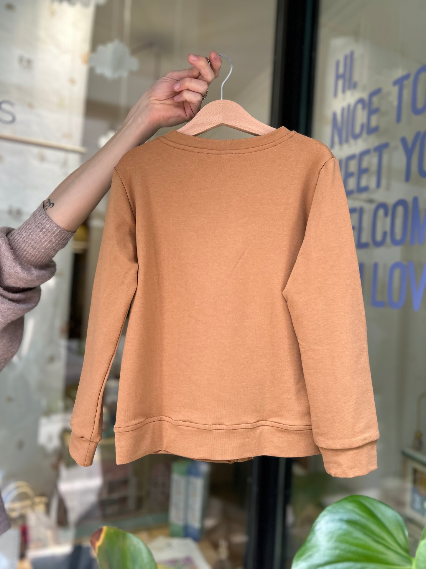 Caramel cardigan with "YEAH" patch