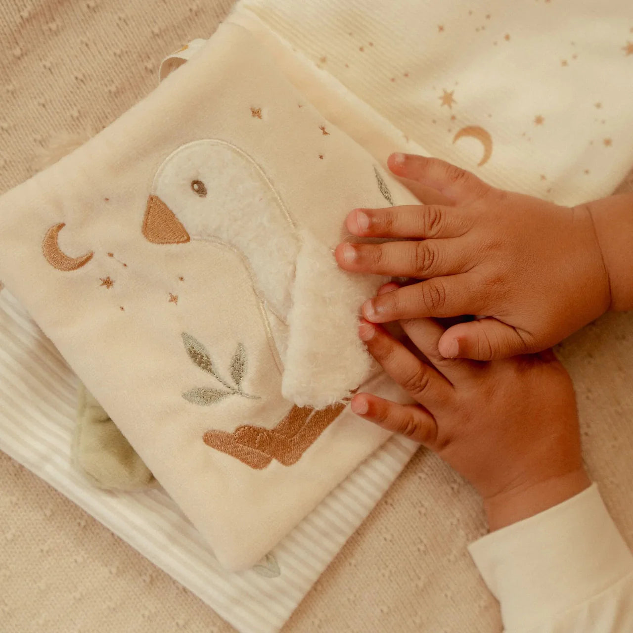 Libro morbido di attività Newborn Naturals