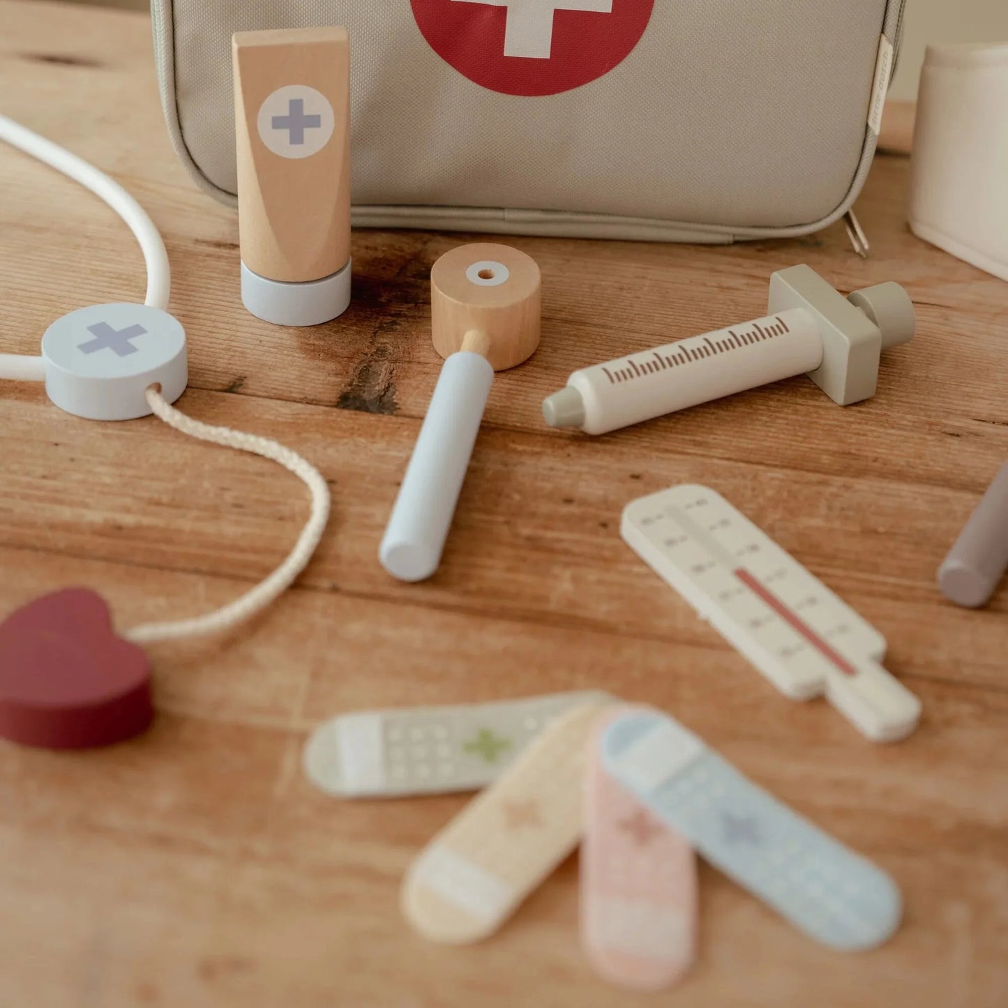 Borsa del dottore con giochi in legno