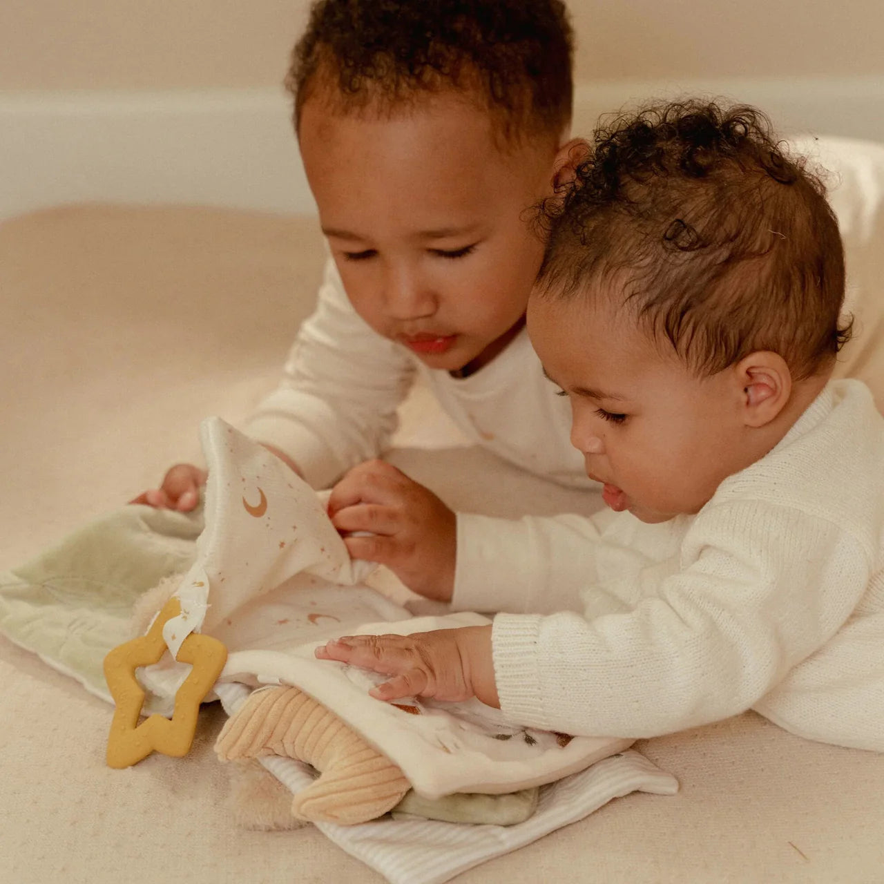 Libro morbido di attività Newborn Naturals
