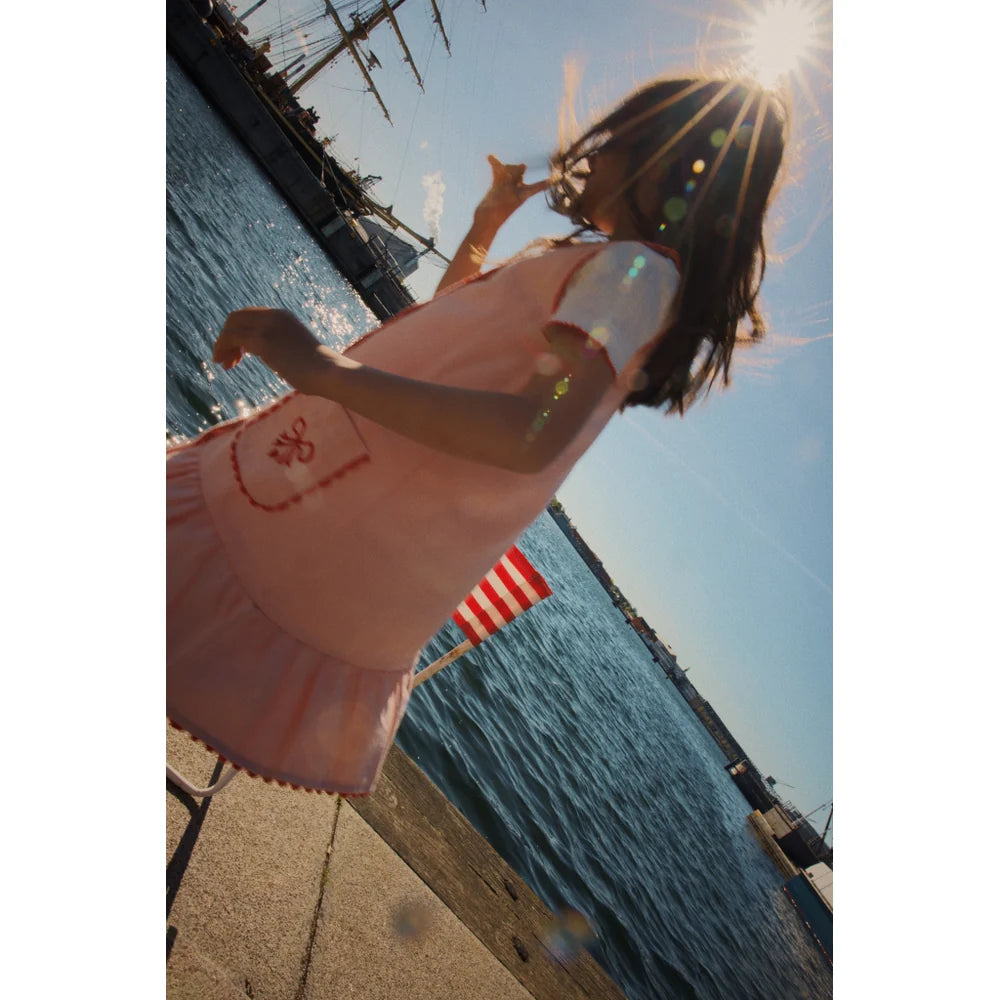 Abito denim rosa fiocchi ricamati Elina