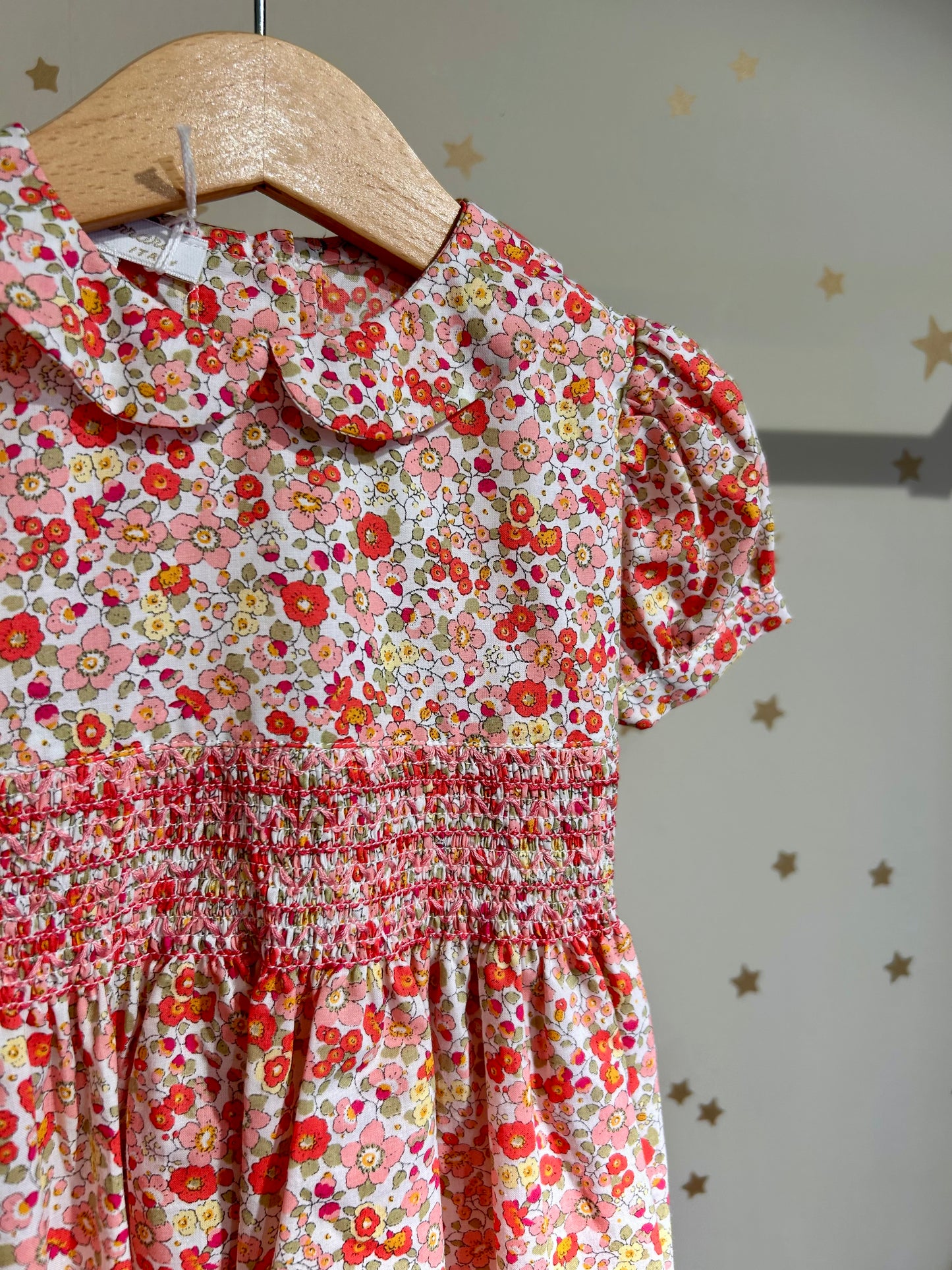 Abito baby fiori punto smock