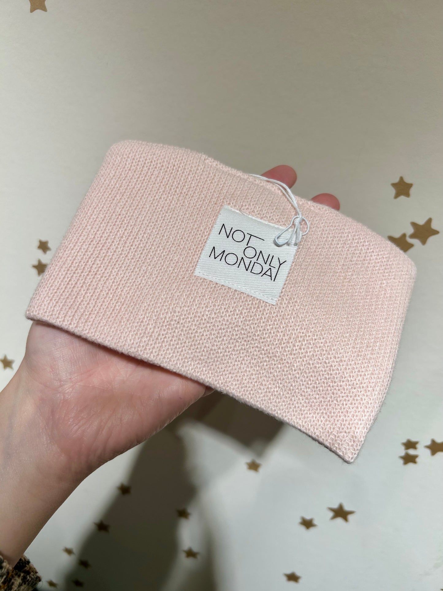 Fascia in maglia rosa pon pon