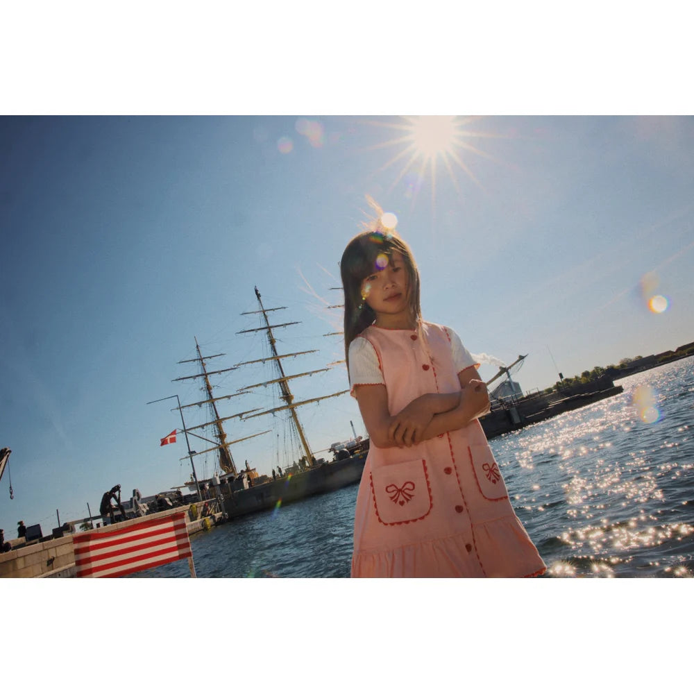 Abito denim rosa fiocchi ricamati Elina