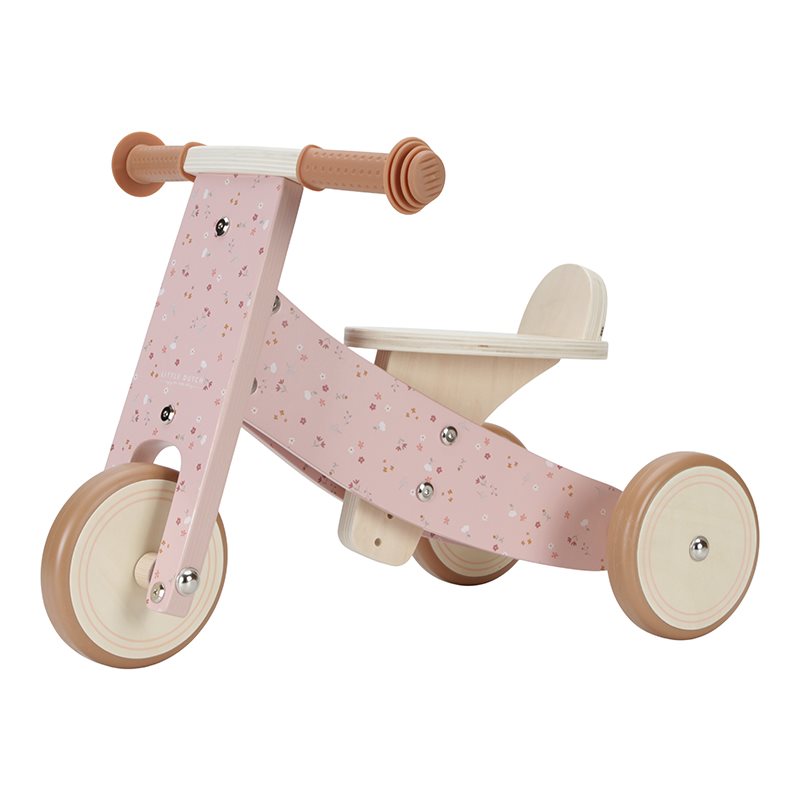 Triciclo in legno rosa e fiori
